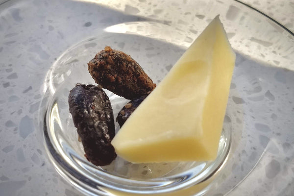 Emmental Cheese with Good King Love Warmly-Spiced Caramelized Cacao Beans