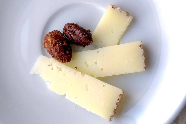 Manchego Cheese with Good King Strength Spicy Citrusy Cacao Beans