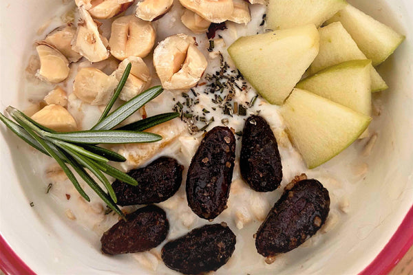 Oatmeal Breakfast Bowl with Apple, Cacao, Hazelnuts, and Rosemary Recipe