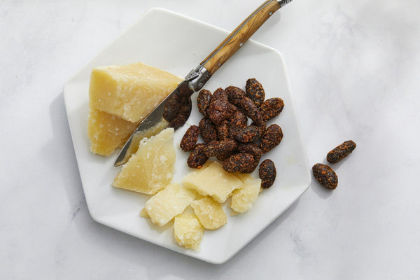 Parmigiano-Reggiano Cheese with Lightly Caramelized, Citrus and Chili-Spiced Cacao Beans
